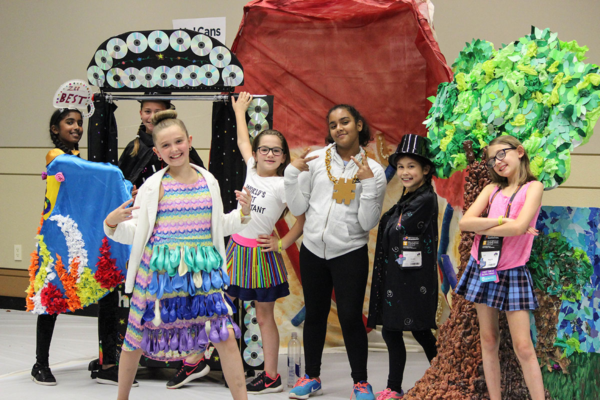 Students posing for a photo during a Destination Imagination tournament
