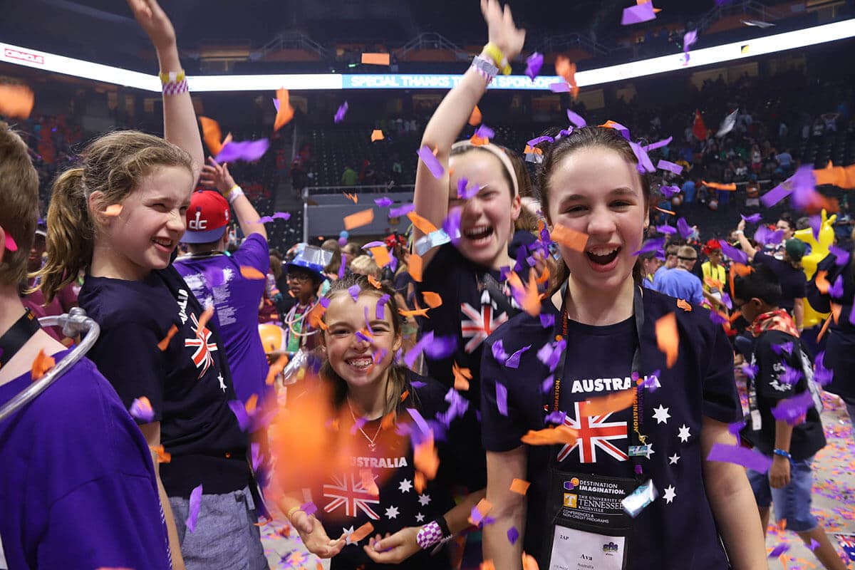Students celebrating at Destination Imagination's Global Finals tournament