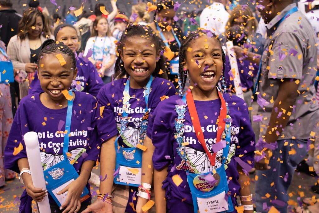 Students celebrating at Destination Imagination's Global Finals tournament