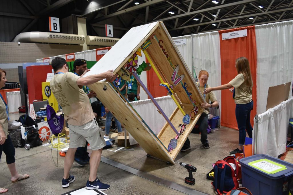Students storing a prop during a Destination Imagination tournament