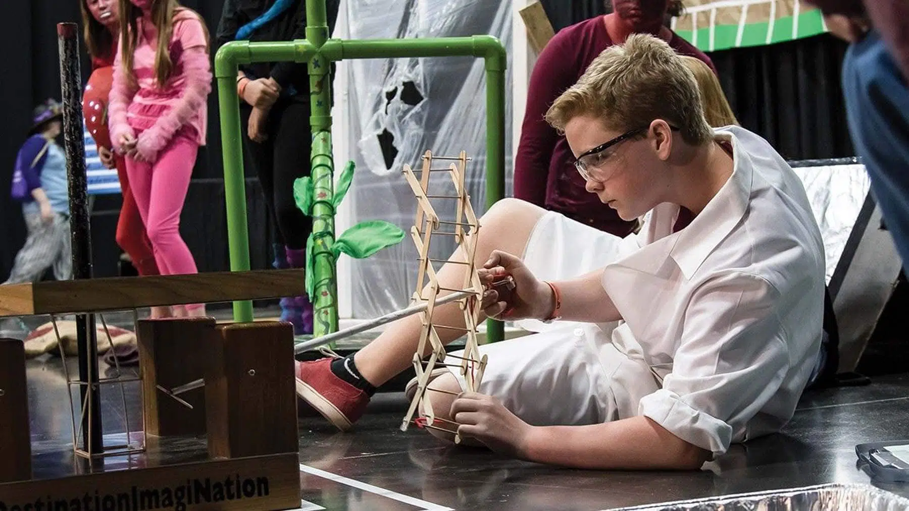 Student participating in a challenge during a Destination Imagination tournament