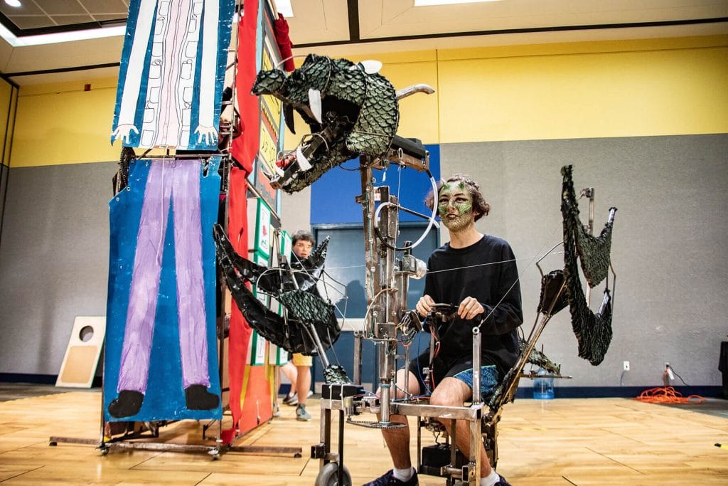 Student participating in a challenge during a Destination Imagination tournament