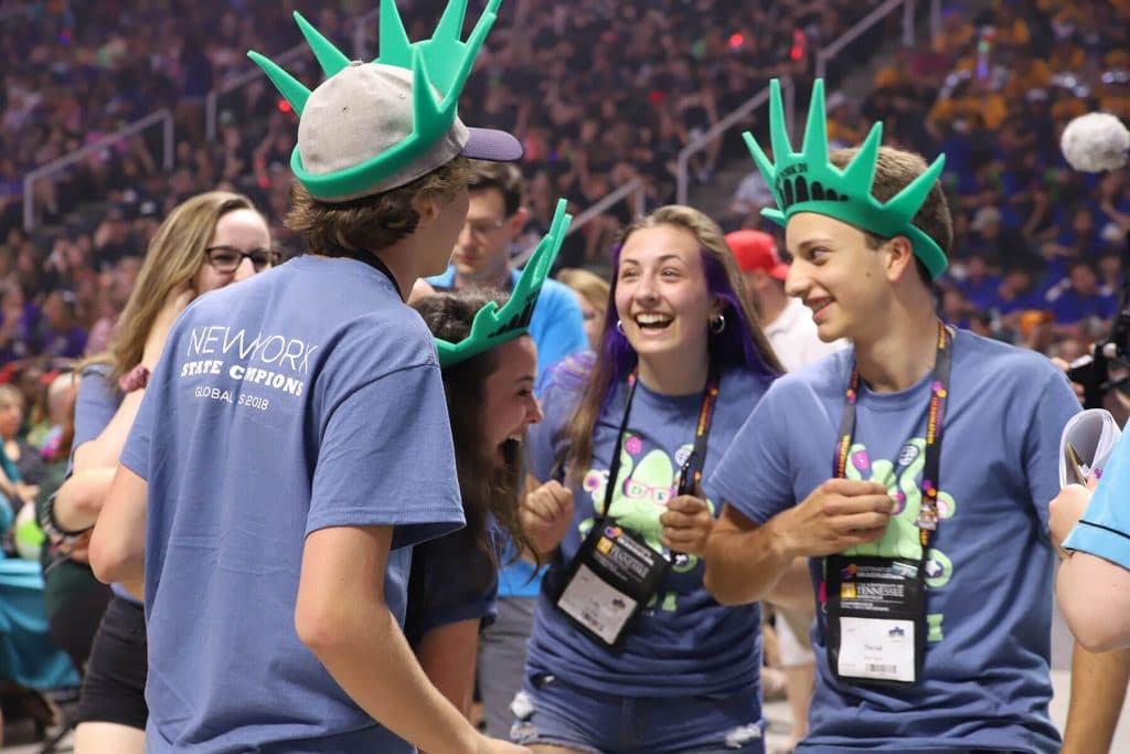 Destination Imagination of New York students smiling during the Destination Imagination Global Finals tournament