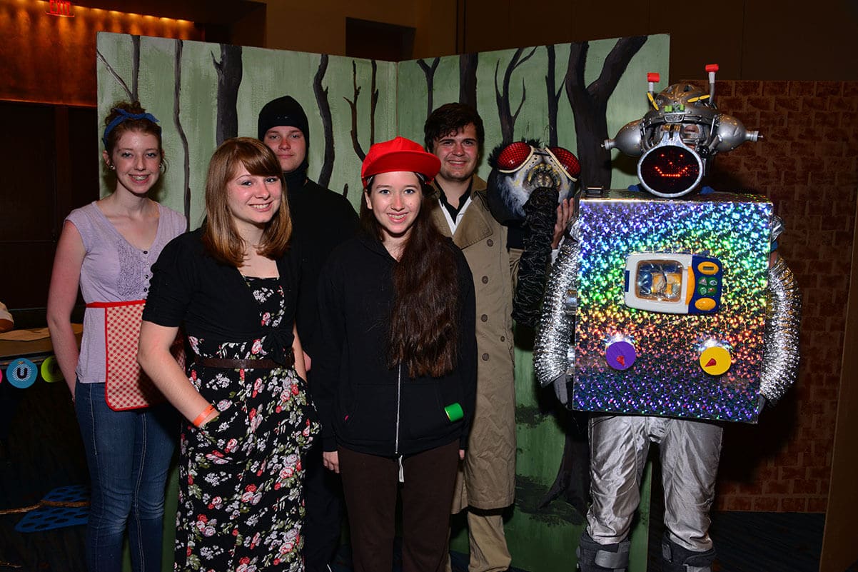 Students posing for a photo at a Destination Imagination tournament