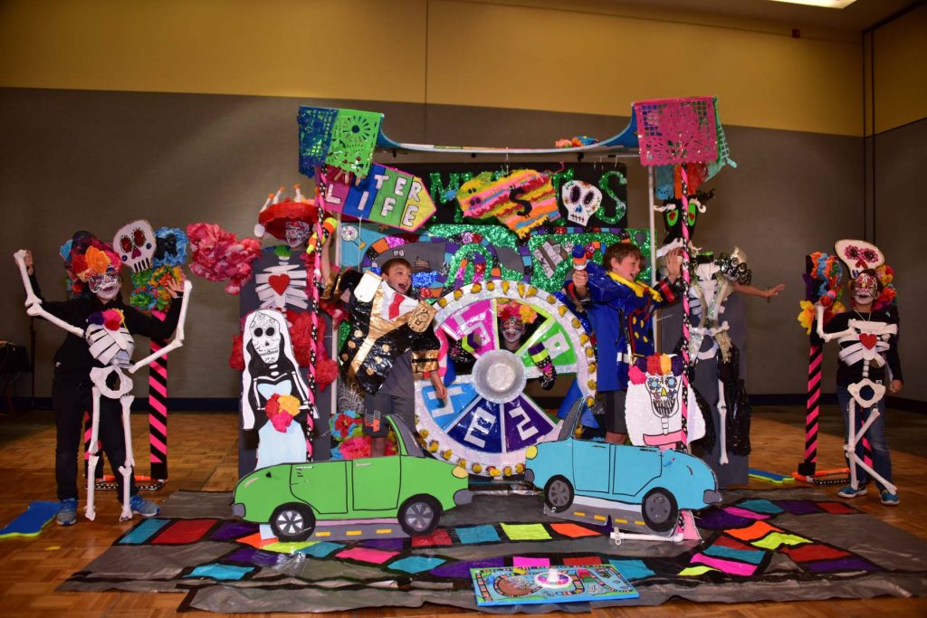 Students participating in a challenge during a Destination Imagination tournament
