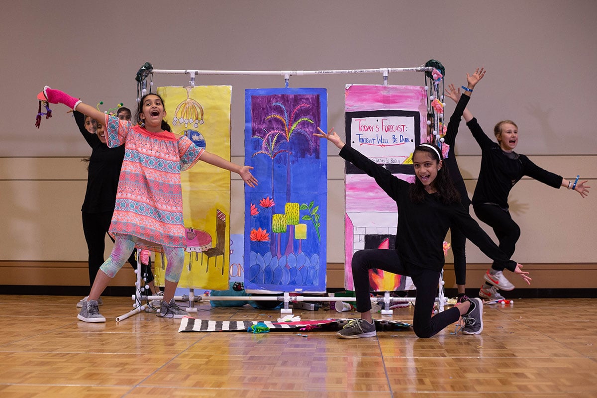 Students participating in a Destination Imagination scientific challenge