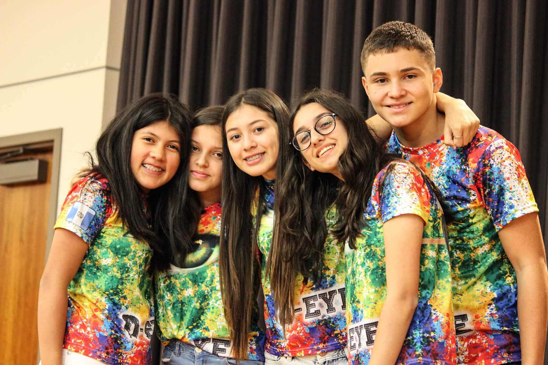 Students posing for a photo during a Destination Imagination tournament